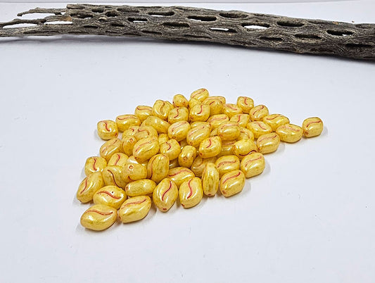 Czech Glass Beads Wavy, Oval Beads-Yellow Luster with a Peach Wash  11x08 Pkg of 10