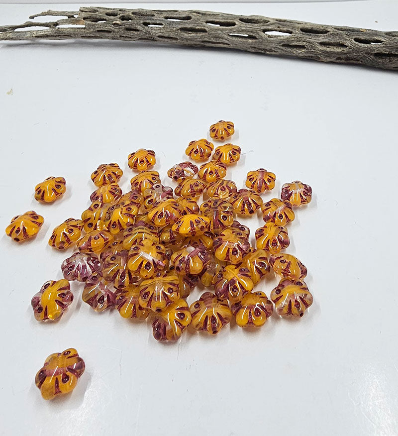 Czech Glass Beads -Folklore (Puffy) Flower Beads 11x11 transparent yellow/orange with a Metallic Red Wash Pkg of 10