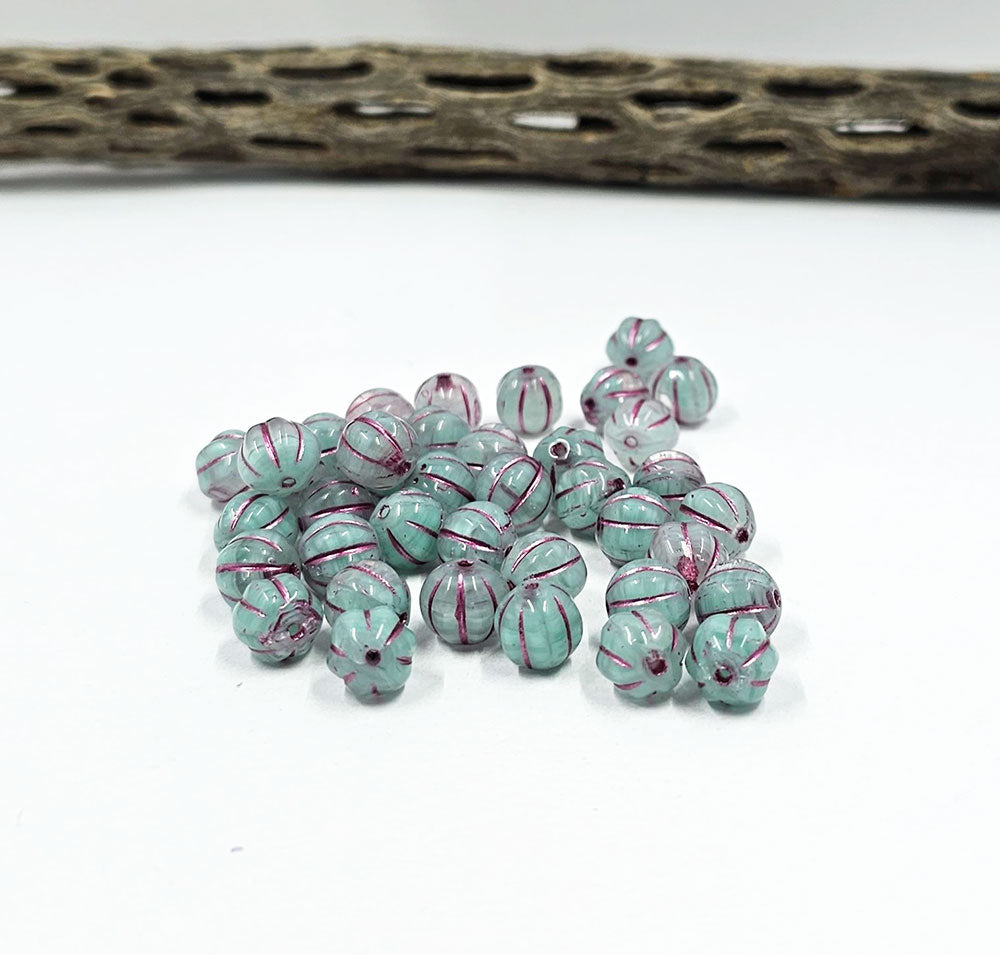 Czech Glass Beads "Melon" Light Blue encased in clear with a rose wash 8mm  Pkg of 10