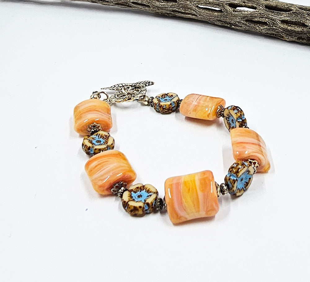 Lampwork Glass Bead Bracelet-Orange/yellow glass nuggets with Czech hawaiian flowers