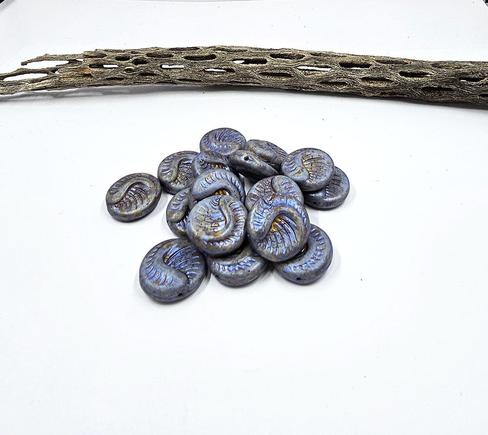 Czech Glass Fossil Bead 19x19 Ivory with a blue and copper wash. Pkg of 4